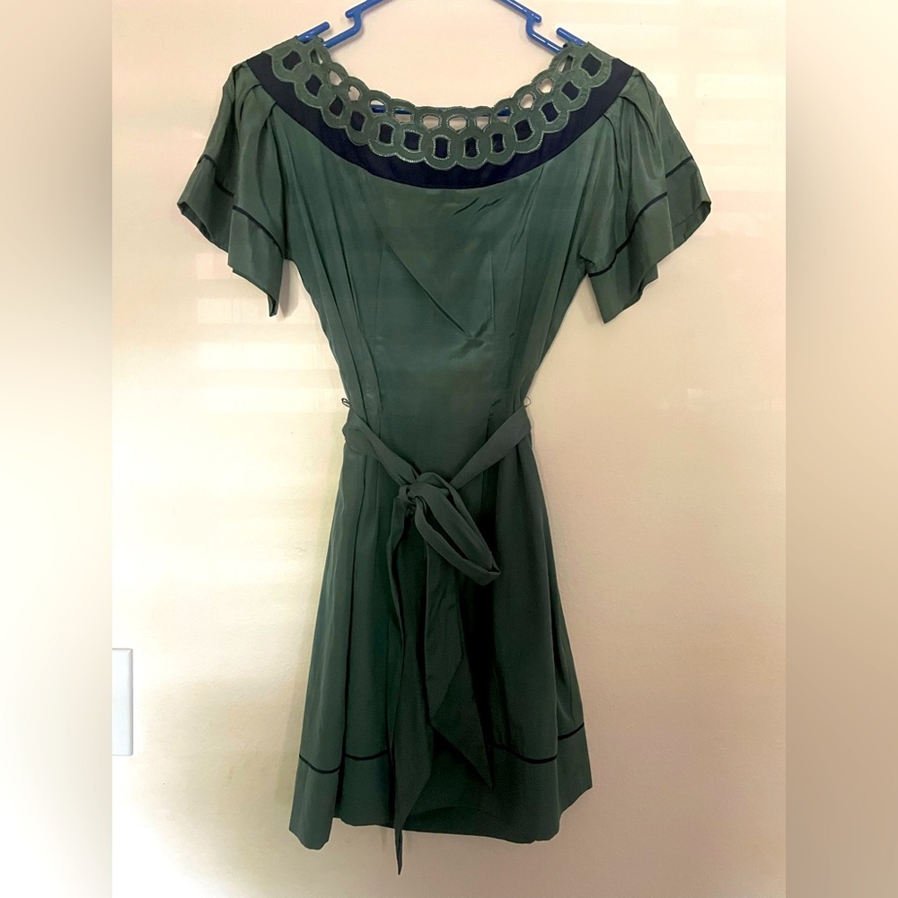 Gorgeous versatile dress with a beautifully detailed collar bone area.